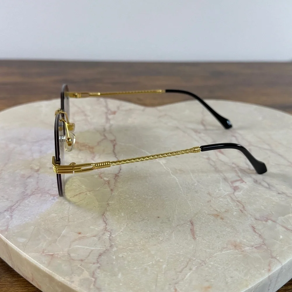 Gold and Blue Rimless Sunglasses